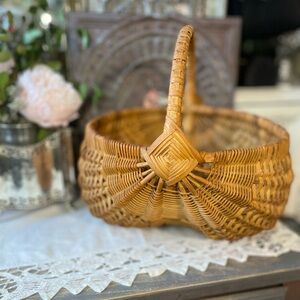 Vintage woven wicker rounded buttocks basket French country cottage farmhouse